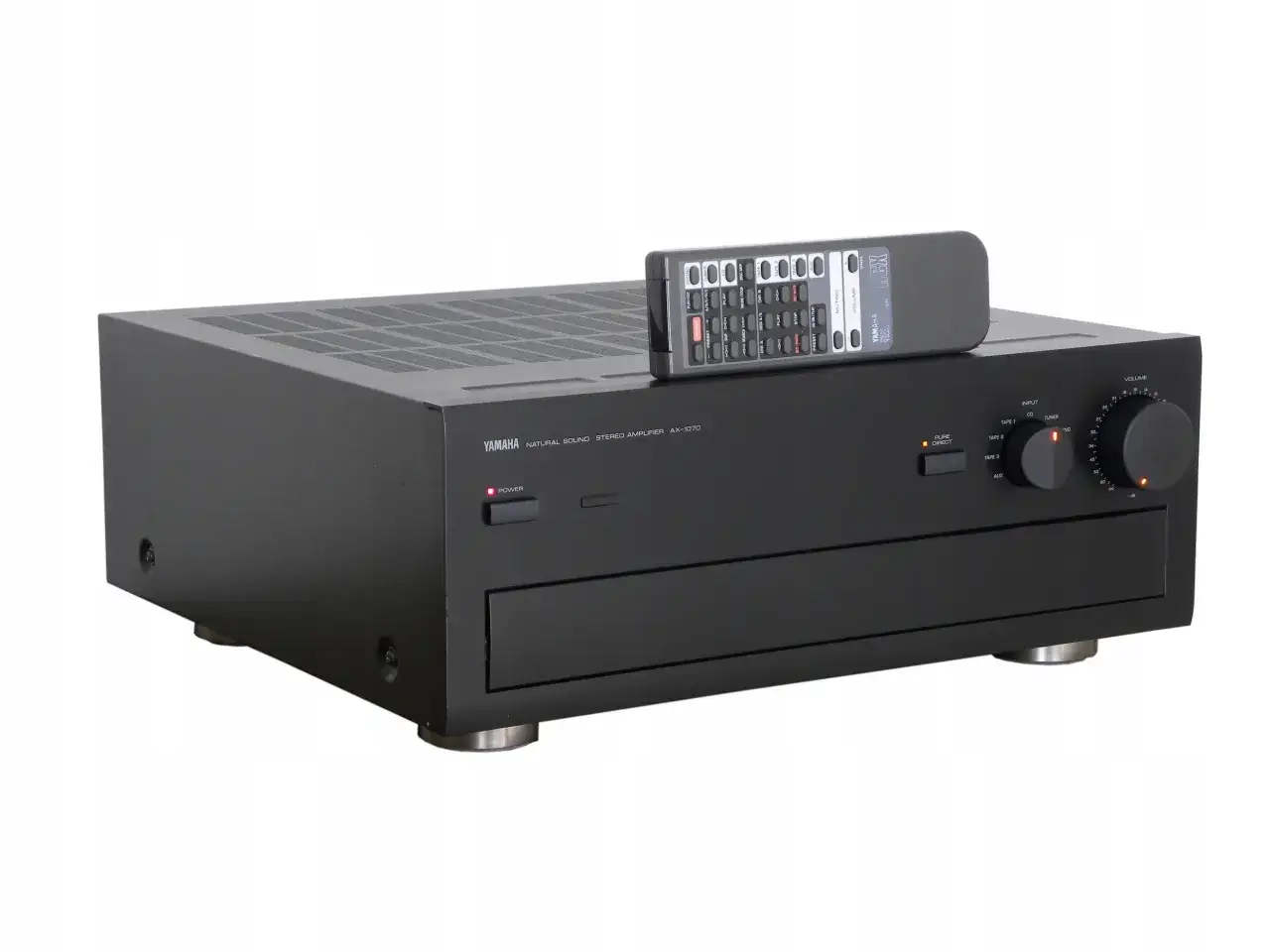Wzmacniacz stereo Yamaha AX-1070 z pilotem. Klasyczny sprzęt audio, gotowy do odtwarzania ulubionej muzyki.